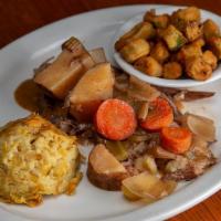 Juicy Pot Roast · Chunks of tender beef and vegetables slow-roasted overnight in our special blend of
spices a...