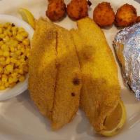 Catfish Feast · Three pieces of breaded or grilled with Hush puppies. Spice it up by making it Cajun!
