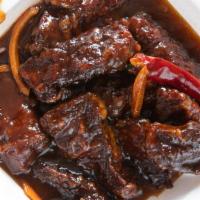 Orange Flavored Beef / 陈皮牛 · Hot and Spicy. This is a mouth watering dish. Thick slices of prime beef seasoned and coated...