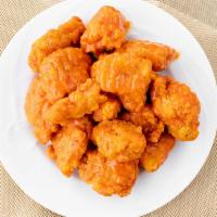 Bbq Bites · Our delicious boneless chicken bites covered with a tangy BBQ sauce and served with a side o...