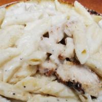 Penne Alfredo · Penne noodles smothered in our delicious, creamy alfredo sauce & topped with parmesan cheese.