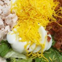 Cobb Salad (Family -Serves 6) · Romaine blend, spinach leaves, turkey, bacon, egg, grape tomatoes & cheddar cheese. Served w...