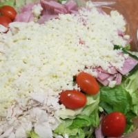 Chef Salad (Small - Serves 2) · Lettuce, tomato, premium breast of turkey, ham & cheese. Served with Ranch dressing.