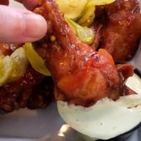 Wings · Your choice of Buffalo wings with celery, carrots and blue cheese or BBQ wings with bread & ...