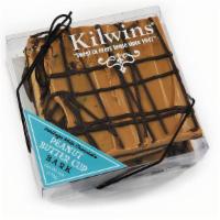 Dark Chocolate Peanut Butter Bark · A layer of Kilwins Heritage Dark Chocolate covers peanut butter cup filling, drizzled in Dar...