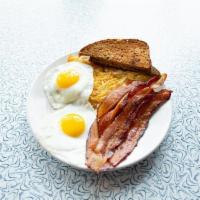 All American Breakfast · Two eggs any style with your choice of bacon sausage, or ham served with crispy hash browns ...