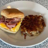 Breakfast Sandwich · Ham, bacon or sausage with scrambled egg and american cheese on a croissant, biscuit or engl...