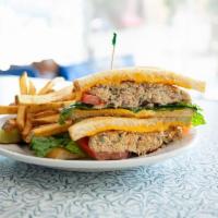Tuna Melt · Our fresh homemade tuna salad topped with american cheese, lettuce and tomato grilled to per...
