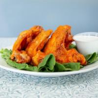 Chicken Wings · Traditional jumbo whole wings or boneless classic wings served with our homemade ranch or bl...