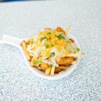 Poutine · A mountain of hand cut fries topped with cheese curds and smothered in your choice of gravy....