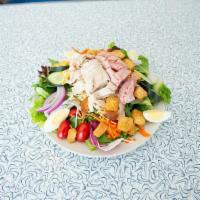 Chef · Fresh romaine and spring mix greens, shredded carrots, cucumber, red onion, tomato, deli ham...