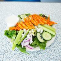 Buffalo Chicken Salad · Fresh romaine and spring mix greens, shredded carrots, cucumber, red onion, tomato and blue ...