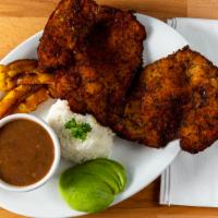 Chuleta De Pollo (Milanesa) · Breaded chicken breast served with rice, beans, sweet plantains, choice of salad or avocado.