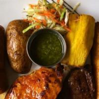 Los Socios · Sirloin Steak, grilled chicken, chorizo, potato, fried yuca, sweet plantain, and salad with ...