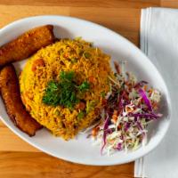 Arroz Con Pollo  · Shredded chicken with beef sausage mixed with yellow rice, creole sauce, peas and carrots. S...