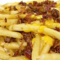 Loaded Fries · Fries topped with shredded cheddar cheese and hickory smoked bacon. Served with Boom-a-rang ...