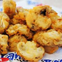 Fried Mushrooms · Large portion of mushrooms breaded to order. Served with Boom-a-rang Ranch