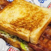 Ultimate Blt Sandwich · ½ lb. of bacon, mayo, lettuce and tomato on grilled Texas toast.