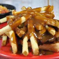 Hot Hamburger Plate · ¼ lb. hamburger patty on grilled Texas toast, piled high with fries and covered with roast b...