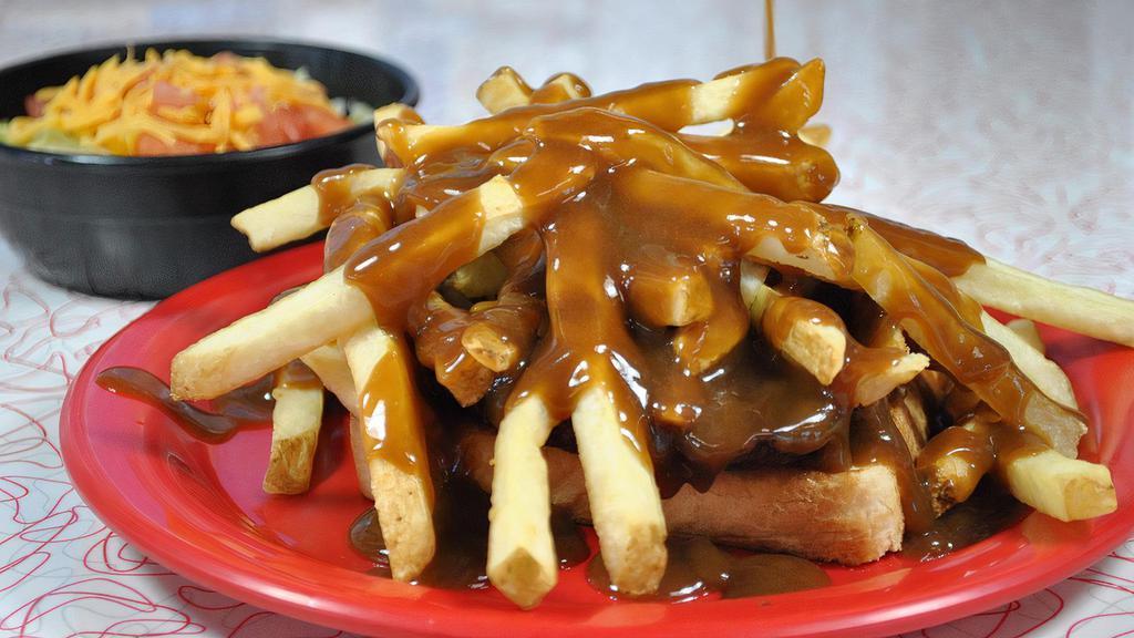Hot Hamburger Plate · ¼ lb. hamburger patty on grilled Texas toast, piled high with fries and covered with roast beef gravy.