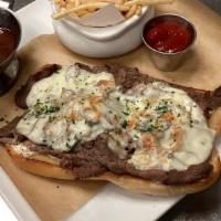 French Dip · slow-smoked beef, caramelized onions, provolone, horseradish creme, au jus