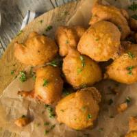 Hush Puppies · Delicious fried cornmeal dough balls.