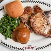 Pork Chop Dinner · Two center cut chops, seasoned and grilled to perfection.
