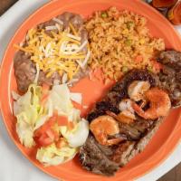 Steak With Shrimp · Served with rice and beans.