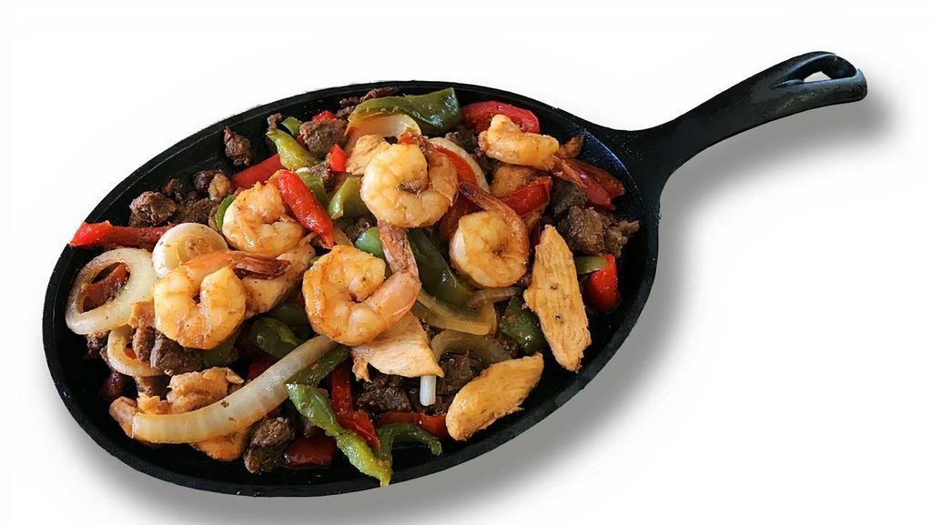 Mixed Fajitas · Beef, chicken, and shrimp. Served with rice and beans.