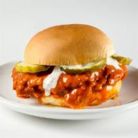 The Buffalo · Crispy white meat chicken with buffalo sauce, ranch and pickles on a potato bun