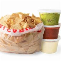 Three Amigos · Bundle includes a large bag of our wildly-addictive chips and pints of queso, guacamole, and...
