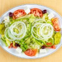 Greek Salad · A blend of crisp iceberg, romaine lettuce, topped with feta cheese, Kalamata olives, peppero...