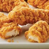Classic Chicken Tenders · Juicy chicken tenders, dipped into a tasty seasoned batter and deep fried until crispy. Serv...