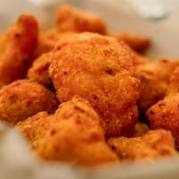 Mac & Cheese Bites · By popular demand our happy hour nosh of deep fried smoked gouda mac and cheese bites with s...