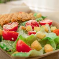 Caesar Salad · Cos lettuce, parmesan and house made garlic croutons tossed in our Caesar dressing.