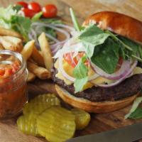 Brit'S Burger · With your choice of stilton English blue or dubliner Irish cheddar, tomato bacon jam, and le...