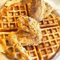 Chicken And Waffles · 1 golden waffle with 2 pieces of fried chicken wings
