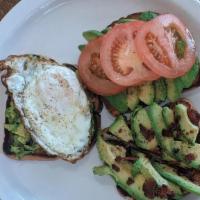 Avocado Toast · A buttered slice of toast with carefully sliced avocado, everything seasoning, and tomato!