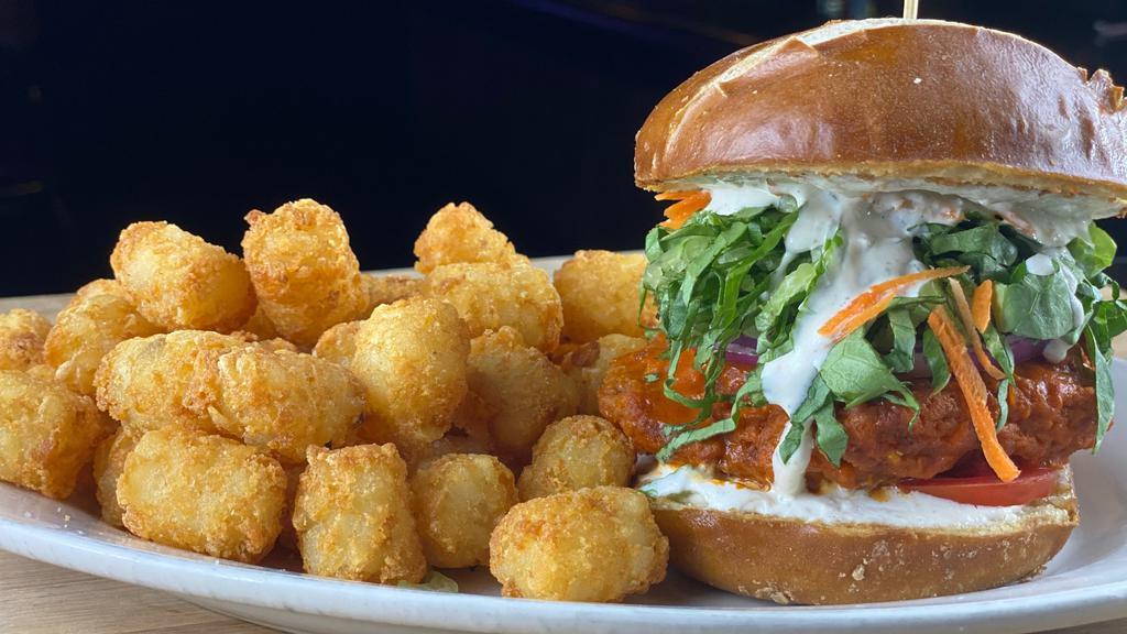 Buffalo Chicken Sandwich Or Wrap · Fried or Grilled all natural buffalo style chicken breast, pretzel bun, lettuce, tomato, onion, carrots, blue cheese or ranch spread.