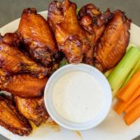 Holiday Wings · 12 Beer brined all natural jumbo wings tossed in your choice of one sauce, side of blue chee...