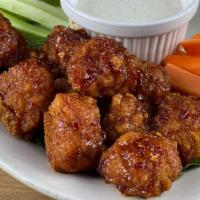 Boneless Wings · 10 Breaded all natural white meat chicken tossed in your choice of one sauce, side of blue c...
