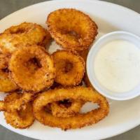 Onion Rings · Thick cut onion rings, breaded and fried.