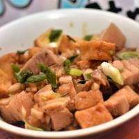 Tokwat Baboy · Boiled pork belly and fried tofu in citrus juice.