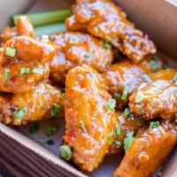 Bone In Wings · 10 jumbo traditional bone in wings, choice of sauce and dressing, celery sticks