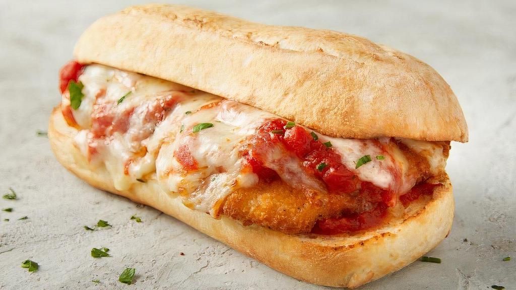 Chicken Parmesan Sub · Deliciously baked chicken breast served on a sub roll topped with pasta sauce, freshly shredded 100% whole milk mozzarella, a sprinkle of Romano cheese, and baked for the perfect combination..