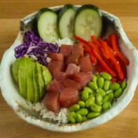 Traditional Ahi Poke Bowl · Sushi grade ahi tuna* marinated in a lemongrass soy ginger glaze, avocado, bell peppers, cuc...