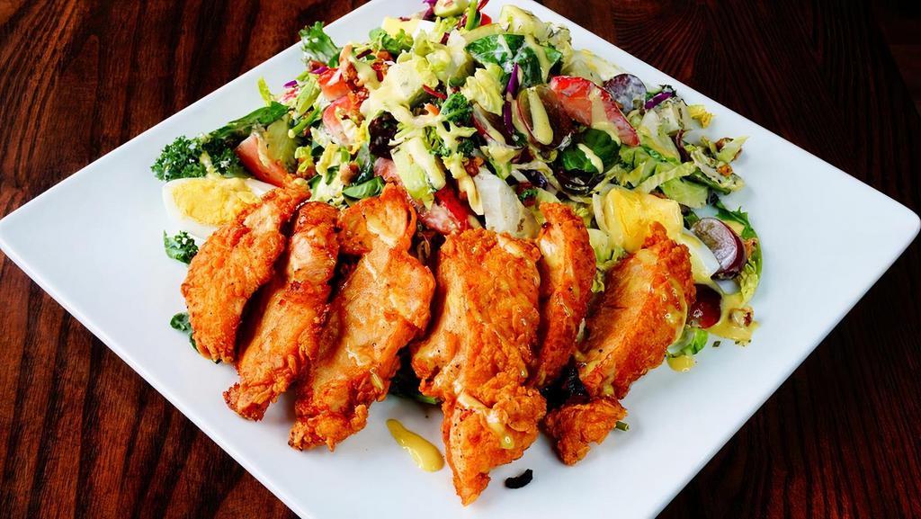 Honey Pecan Chicken Salad Summer · Spring mix, roasted butternut squash, apples, craisins, and hard-boiled egg tossed in green goddess dressing.  Topped with crispy fried chicken, roasted pecans, and honey mustard drizzle.
