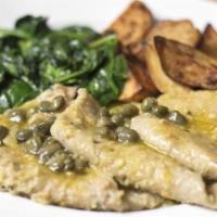Veal Marsala · Veal Cutlets with mushrooms, marsala sauce with yellow potatoes and broccolini.