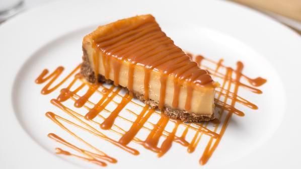 Caramel Cheesecake · This is the cake that made Letizia's famous! creamy caramel cheesecake, crunchy graham cracker crust, topped with out handmade caramel.
