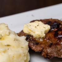 Kc Strip Steak · Prepared foodlove café style and served with garlic mashed potatoes.